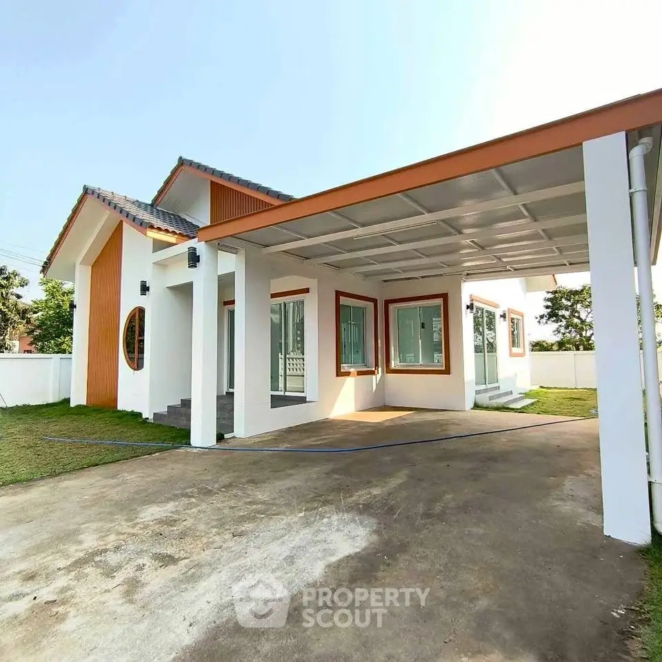 Modern single-story house with carport and spacious yard