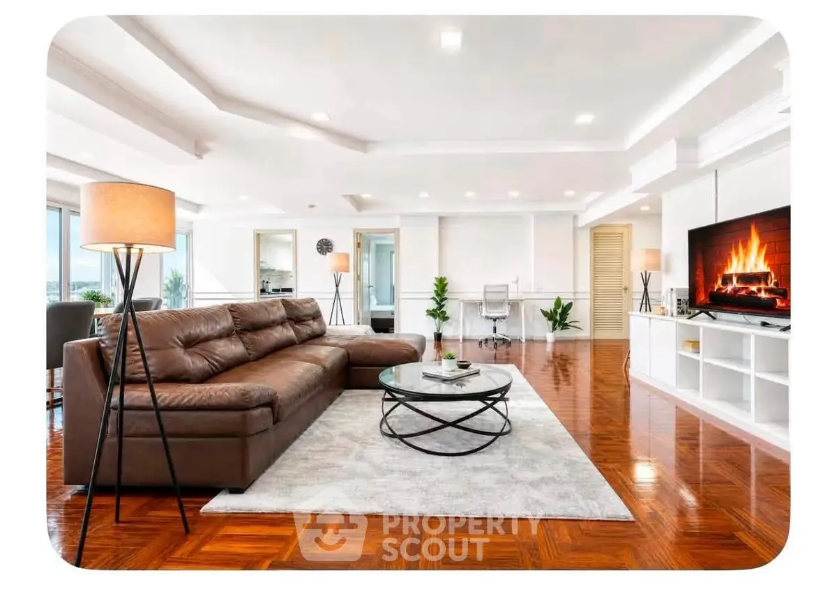 Spacious modern living room with elegant decor and cozy fireplace