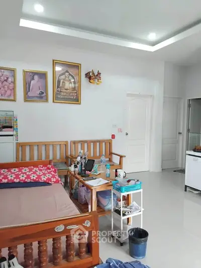 Cozy living room with wooden furniture and modern decor, perfect for relaxation and comfort.