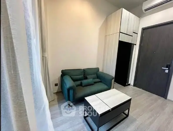 Cozy living room with modern furniture and air conditioning