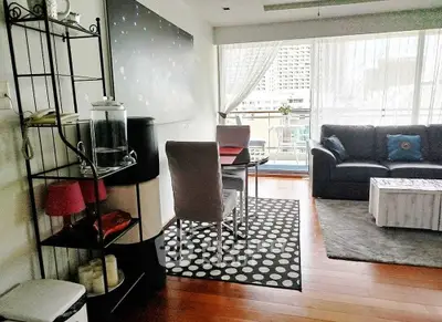 Stylish living room with modern decor and balcony view