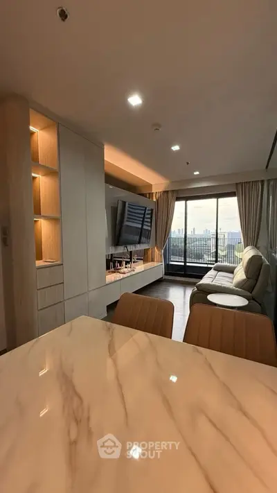 Luxurious living room with city view and elegant marble dining table