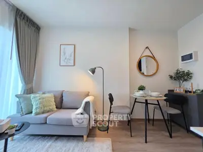 Modern living room with stylish decor and cozy seating area, perfect for relaxation and entertaining.