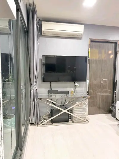 Modern living room with sleek TV setup and stylish decor