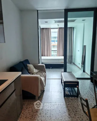 Modern studio apartment with open layout and large windows