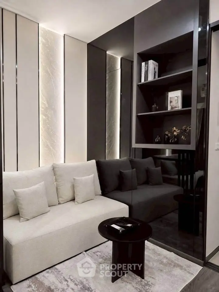 Modern living room with sleek design and cozy seating area