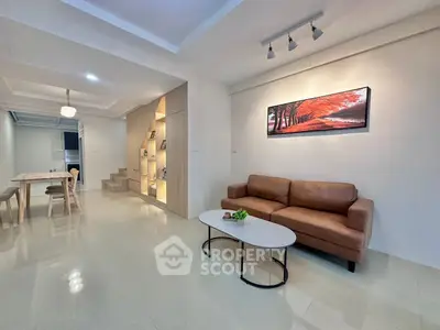 Modern living room with elegant decor and cozy seating area