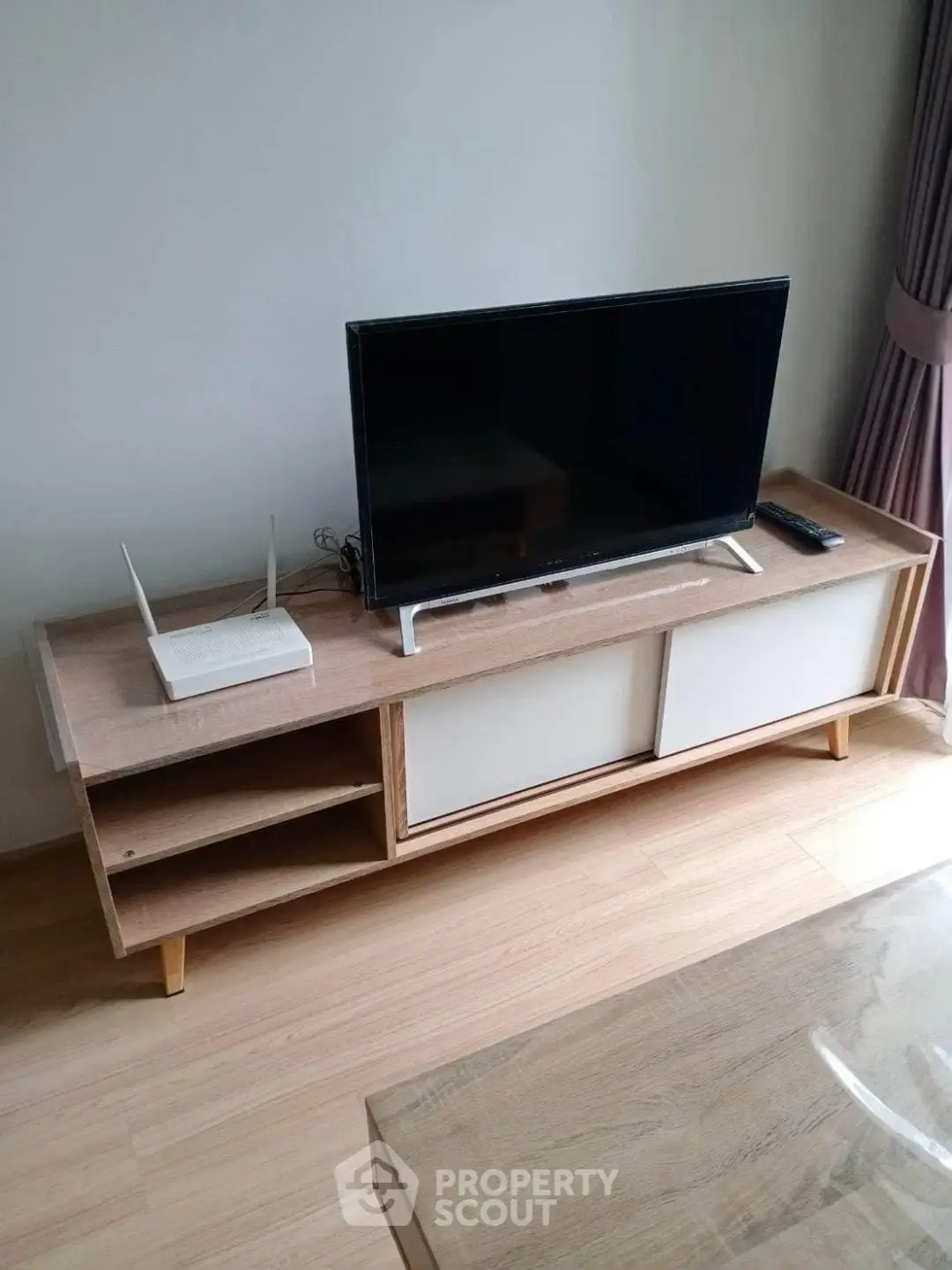 Modern living room with sleek TV stand and minimalist decor