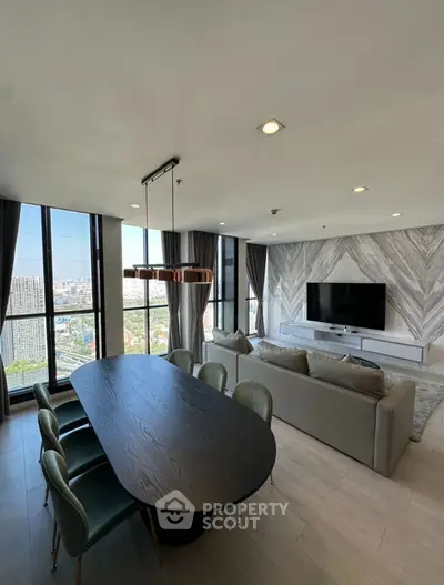 Luxurious modern living room with panoramic city views and elegant dining area.