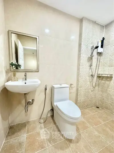 Modern bathroom with sleek fixtures and elegant tile design