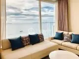 Luxurious living room with stunning ocean view and elegant decor