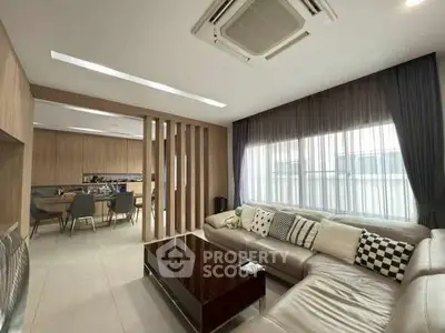 Spacious modern living room with elegant decor and large sectional sofa