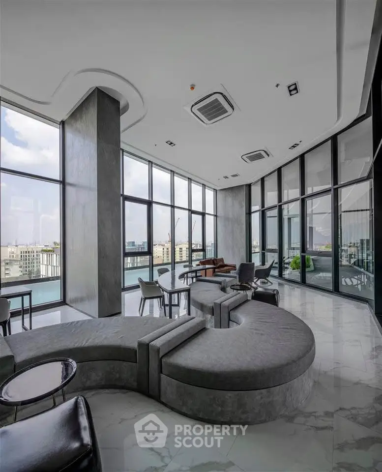 Luxurious modern living room with panoramic city views and stylish furniture.