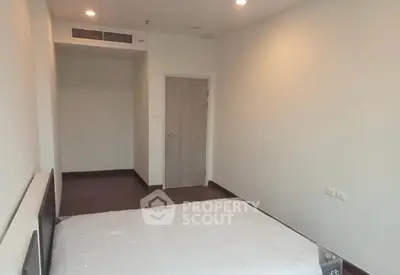 Minimalist bedroom with modern design and wooden flooring