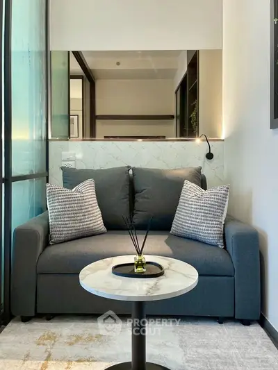 Cozy living room with modern sofa and stylish decor in a bright apartment