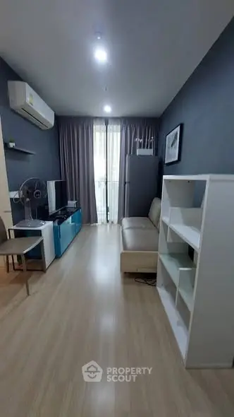 Modern living room with sleek furniture and natural light