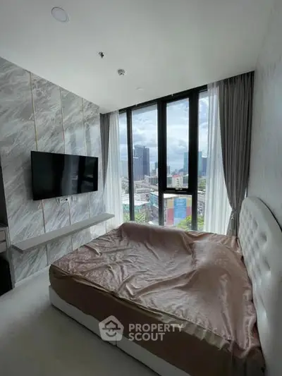 Luxurious bedroom with stunning city view and modern decor