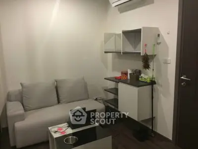 Cozy modern living room with sleek furniture and minimalist design, perfect for urban living.