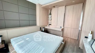 Modern bedroom with sleek wooden paneling and minimalist decor