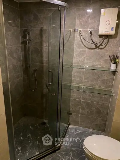 Modern bathroom with glass shower and sleek design