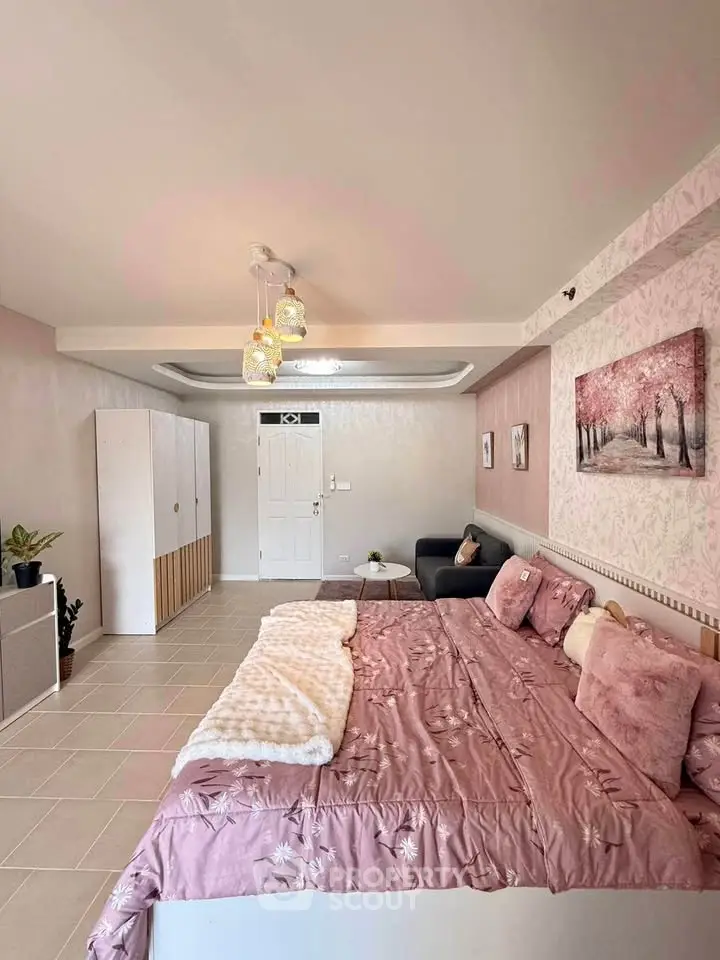 Spacious bedroom with elegant decor and cozy ambiance