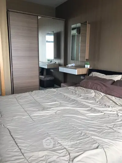 Cozy bedroom with modern decor and built-in wardrobe