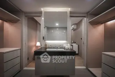 Luxurious modern bathroom with sleek design and ambient lighting
