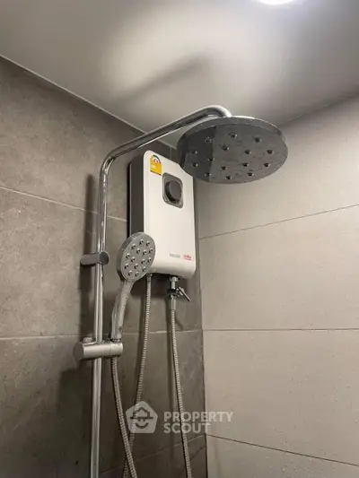 Modern bathroom shower with dual showerheads and water heater