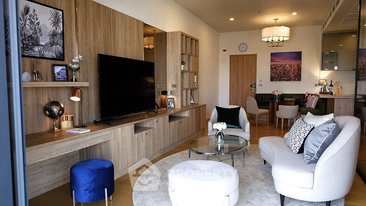 Luxurious living room with modern decor and stylish furniture in a high-end apartment.