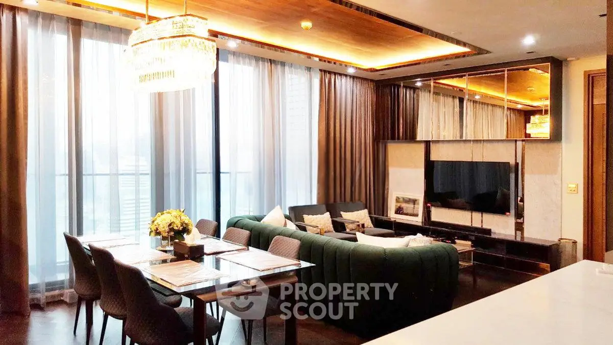 Luxurious modern living room with elegant dining area and large windows