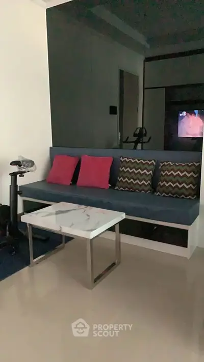 Cozy living room with modern sofa and stylish marble coffee table