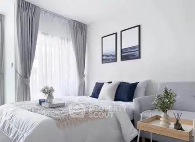 Modern bedroom with elegant decor and natural light