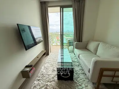 Modern living room with city view, cozy sofa, wall-mounted TV, and stylish decor.