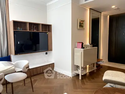 Modern living room with stylish furniture and elegant wooden flooring