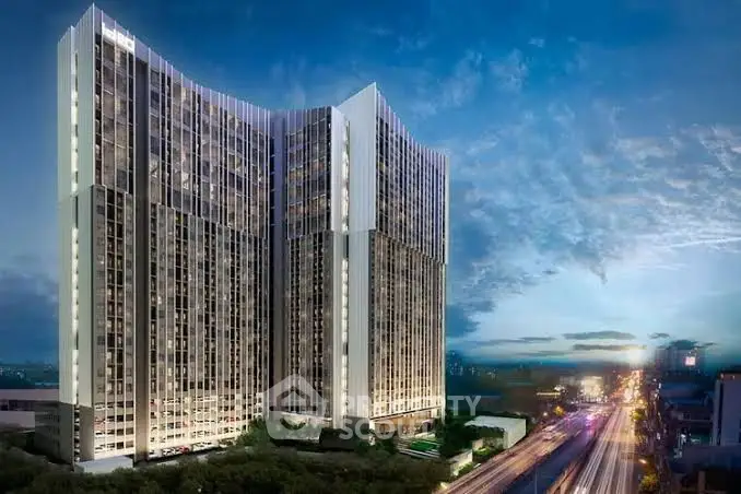 Stunning modern high-rise building with breathtaking city view at dusk.