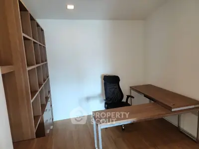 Modern study room with sleek desk and ergonomic chair, perfect for productivity.