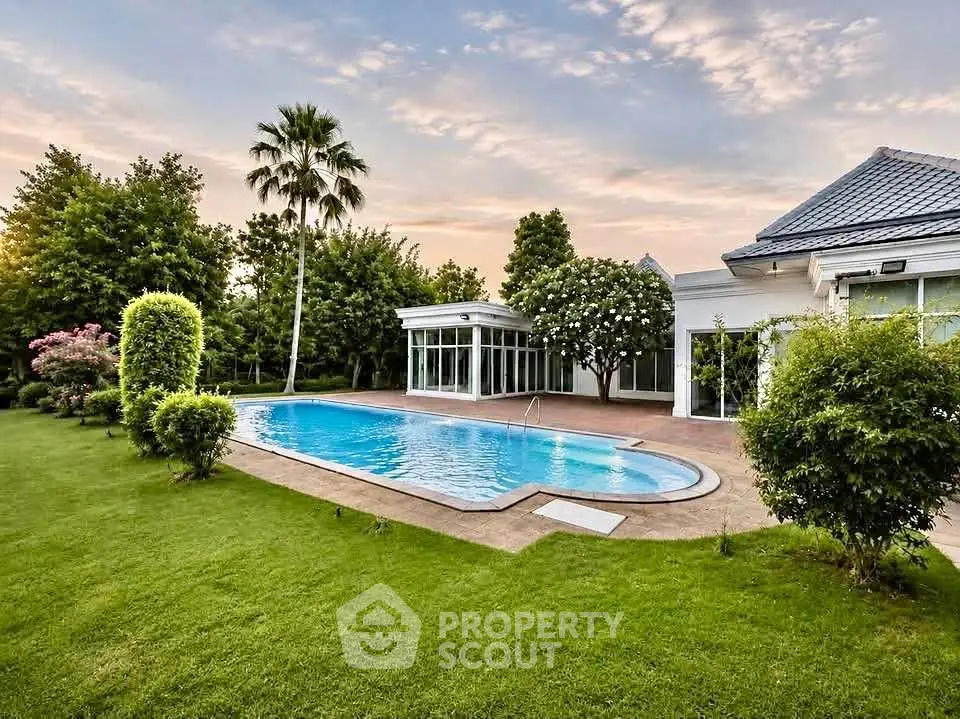 Luxurious villa with private pool and lush garden, perfect for serene living.