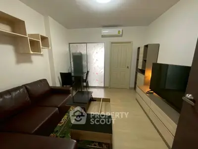 Cozy living room with modern furniture and entertainment setup