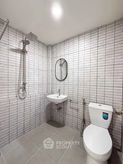 Modern bathroom with sleek tiles and contemporary fixtures