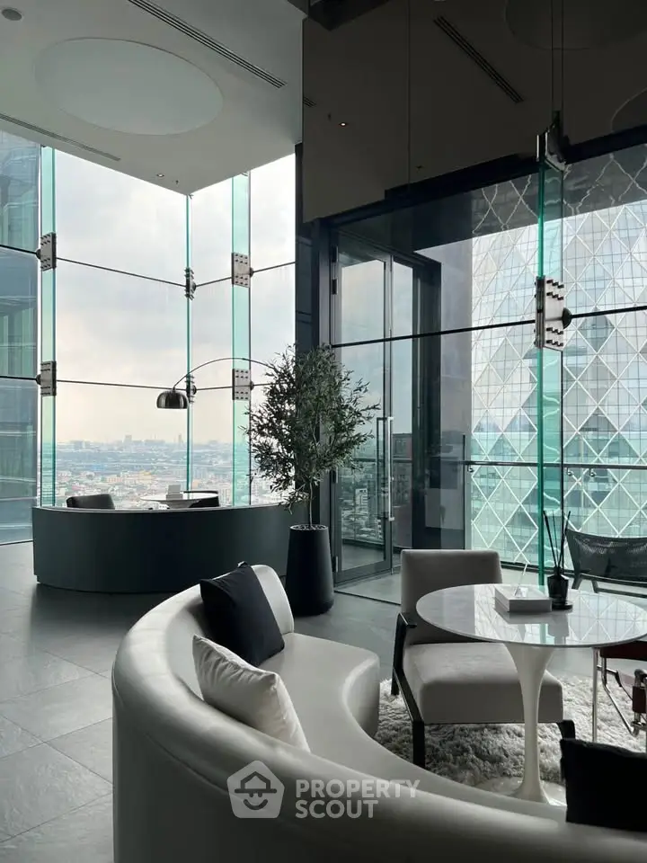 Luxurious modern living room with stunning city view and elegant furnishings.