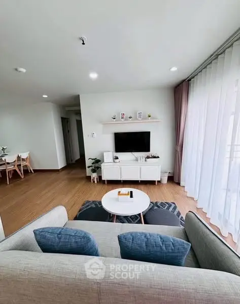 Modern living room with stylish decor and natural light