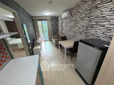 Modern apartment interior with stylish stone accent wall and open layout