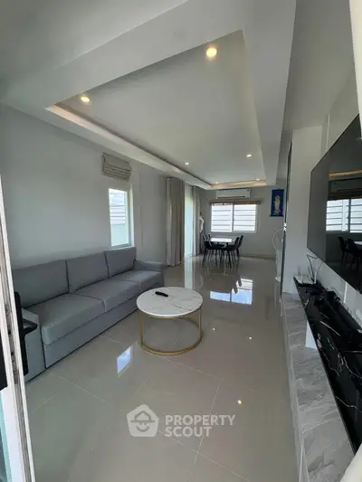 Modern living room with sleek design and elegant furnishings