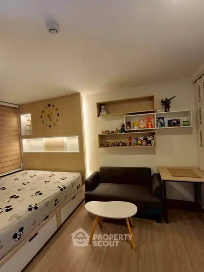 Cozy bedroom with stylish decor and ample storage, perfect for modern living.