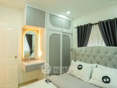 Chic modern bedroom with stylish decor and ample storage space