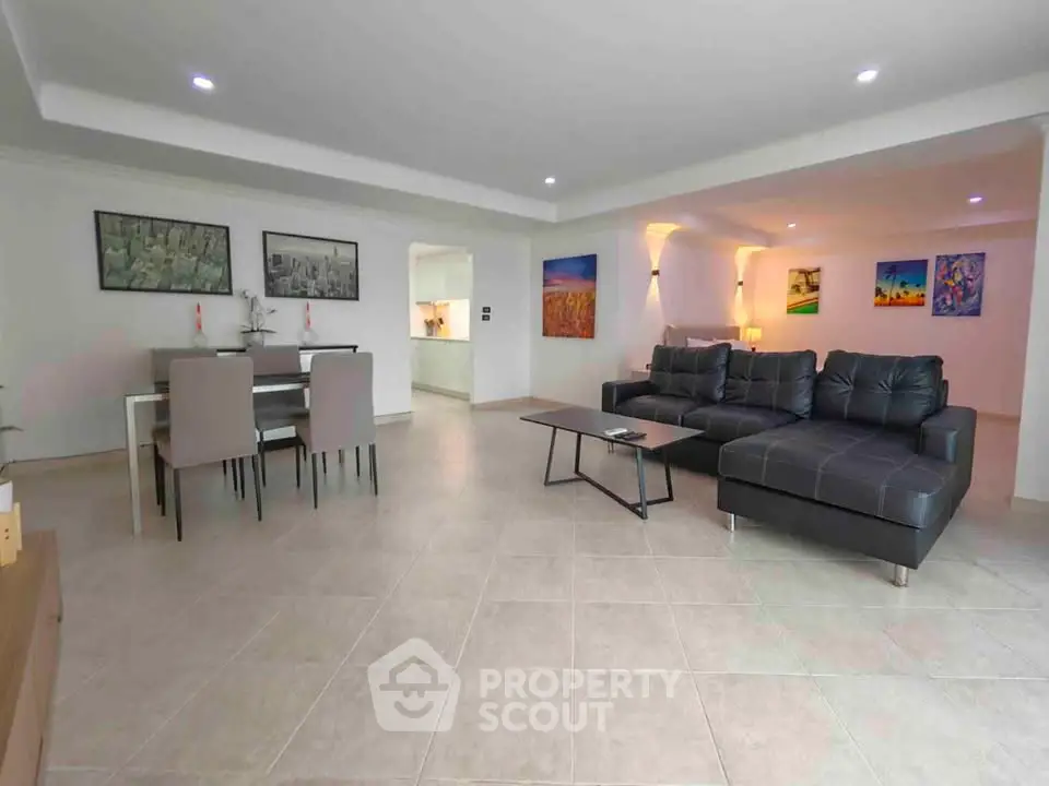 Spacious modern living room with elegant dining area and stylish decor