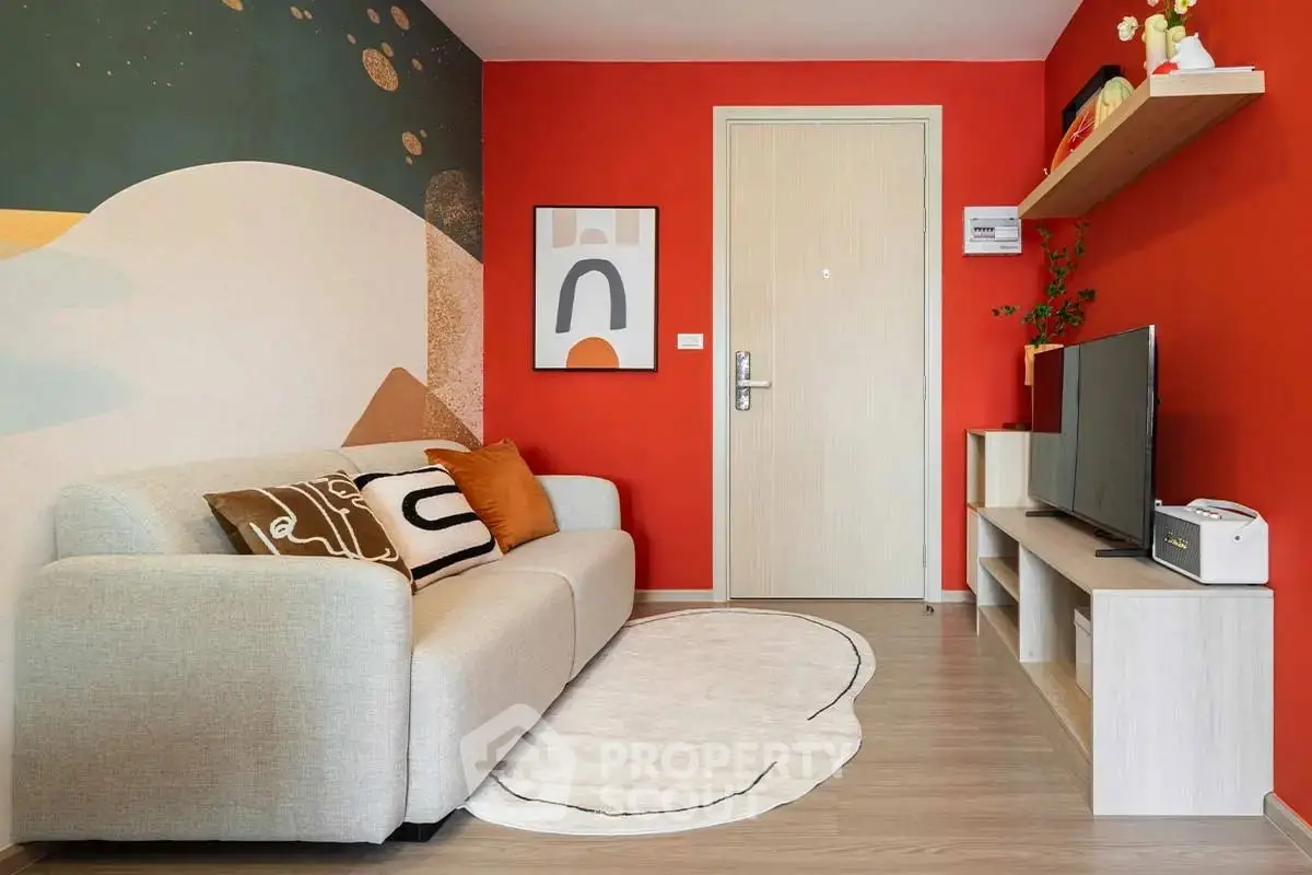 Stylish living room with modern decor and vibrant red accent wall