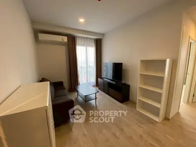 Modern living room with sleek furniture and natural light