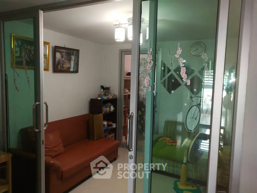 Cozy living room with sliding glass doors and stylish decor