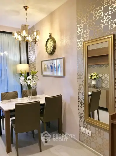 Elegant dining area with stylish decor and modern chandelier